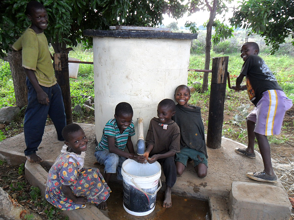 Children in shade at Elephant Pump